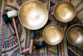Sound Healing instruments on rug